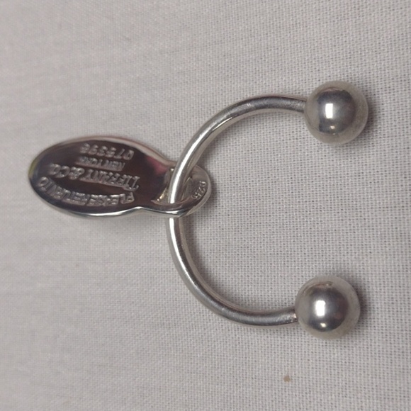 Tiffany & Co. Sterling Silver Horseshoe Key Ring With Dangling Oval Charm - Picture 2 of 4